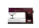 Sewing machine with maroon and white design on a white background